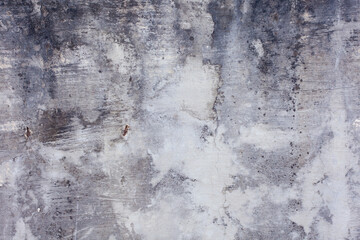Fototapeta premium Abstract grunge background with space for copy. Classic dark grey concrete wall. Texture for displaying objects and graphic design.