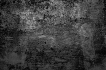 Abstract grunge background with space for copy. Classic dark grey concrete wall. Texture for displaying objects and graphic design.