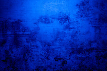 Abstract grunge background with copy space. Classic blue concrete wall. Texture for layout and graphic design.