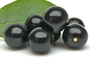 Acai Berries: A close-up captures the vibrant purple of fresh acai berries, showcasing their smooth texture alongside a green leaf, a symbol of their natural freshness. 