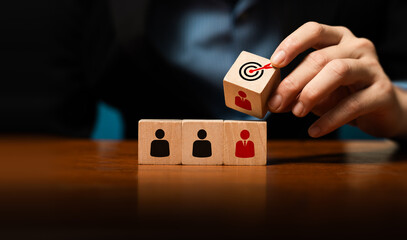 Business Leader Selecting Key Employee with Wooden Blocks, Highlighting Talent Management, Recruitment Strategies, and Targeted Human Resource Decisions for Organizational Success