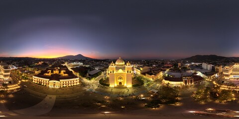 360 aerial photo taken with drone at night of Metropolitan Cathedral of San Salvador on Captain...