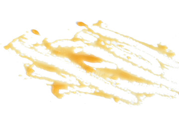 Fototapeta premium A puddle of bee honey smeared on a white surface