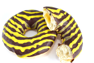 Donut with filling and chocolate on white background