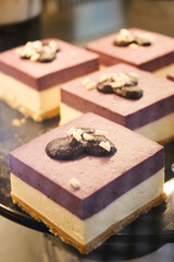 Delicious layered dessert with blueberry and cream on display