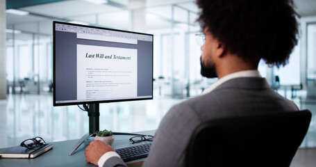 African American man filling out legal documents online