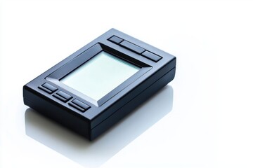 Black rectangle device on white surface illuminated by soft light digital display technology