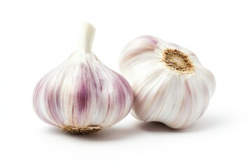 Obraz premium Two heads of garlic, close-up, on white background