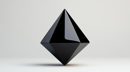 Fototapeta premium A 3D rendering of a black, faceted pyramid.