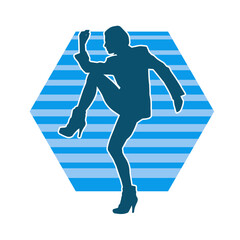 Silhouette of a female dancer in action pose. Silhouette of a slim woman in dancing pose.