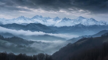 Mountain range panorama, snowy peaks, misty valley, serene landscape, for wallpaper or nature lovers