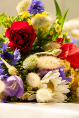 A delightful arrangement of wildflowers bursts with color and texture, celebrating nature's beauty