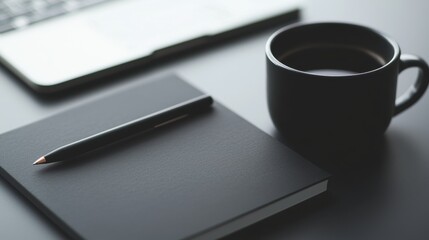 A black notebook, pen, and coffee mug on a desk.