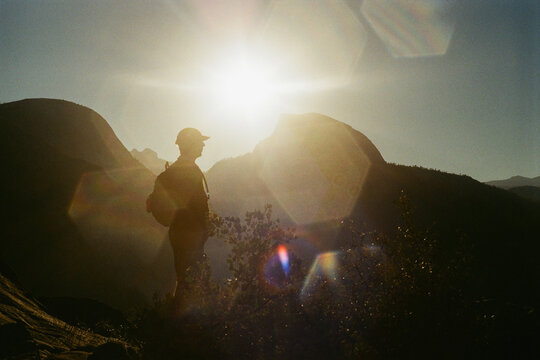 A Silhouetted Figure in Front of  Yosemite's Half Dome
