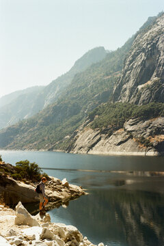 Hiker Exploring Hetch Hetchy's Resevoir on a Day Hike