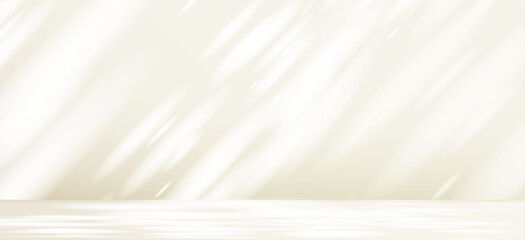 Glare from the sun's rays on the wall. Blurred shadows from leaves and plants in the room. Soft overlay of natural light. Abstract background for product presentation.Natural light layout.