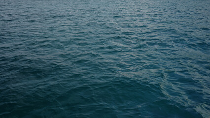 small ripples and waves on Indian ocean with morning light