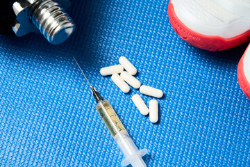 Doping. Steroids and anabolics on sports carpet. Concept of doping athletes to achieve highest results. Prohibited sports drugs. the sport of the highest achievements is possible only with doping.
