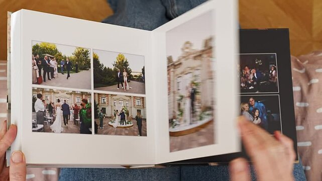 Female hands flipping through a photo book with wedding photos