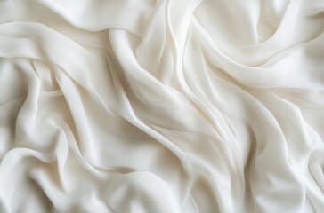 Fototapeta premium Creamy silk fabric drapes, close up