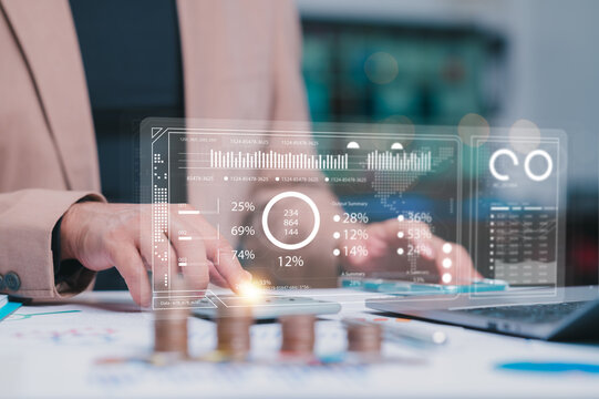 Immersive Data Visualization Person Interacts With Virtual Financial Data Overlay, Analyzing Statistical Percentage Trends On Laptop And Phone Within Data Driven Culture, Boosting Finance Insights