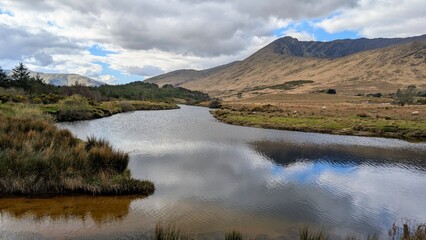 Beautiful landscape scenery, river Erriff surrounded by mountains near Aesleagh falls, county Mayo, Ireland, nature background