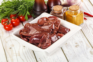 Raw chicken liver uncooked in the bowl