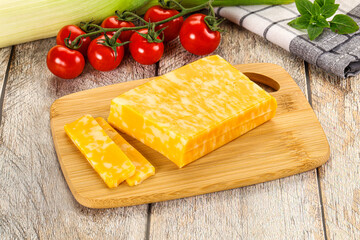 Marble yellow cheese with slices