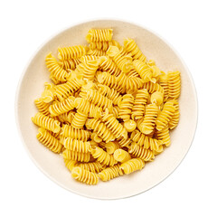 Pasta close-up. Fusilli spirale in a bowl, isolated on white background. Full depth of field. File contains clipping path.