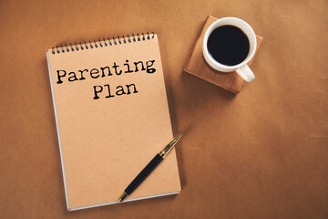 paper with the word plan of parenting