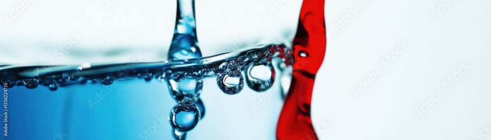 Poster close up view of water droplets and liquids mixing