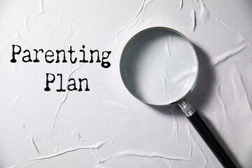 magnifying glass with parenting plan