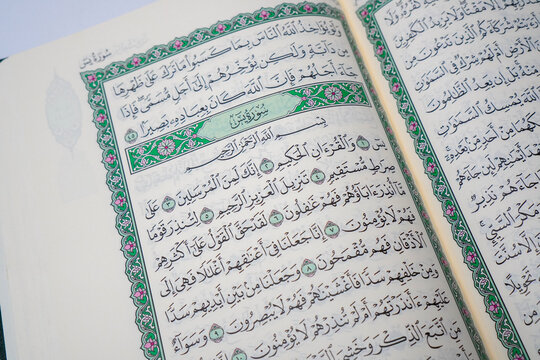 An open Quran showing Surah Yasin, known as the heart of the Quran
