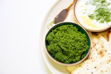 Vegan recipes with tortillas and wolffia spread on wooden plate. Wolffia is the nutrient-rich plant-based source of protein and omega3 and vital minerals.