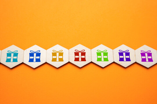 A chain of gifts and winning prizes. Series of prizes, rewards, or giveaways. Loyalty programs, promotional events, and charitable donations. Ongoing prize distributions.