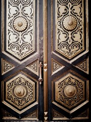 Vintage decorative door with golden floral details