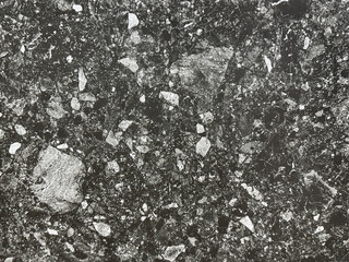 Colorful black terrazzo granite tiles texture. Terrazzo is increasingly being used in contemporary edgy and stylish interior as wall or floor finishing.