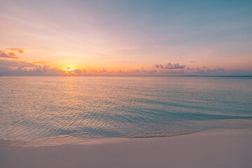 Serenity closeup sea sand beach. Amazing nature landscape. Inspire tropical beach seascape horizon. Orange gold sunset sky peaceful tranquil relaxing sunlight summer mood. Vacation travel holiday