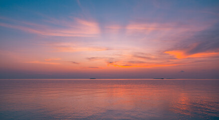 Obraz premium Fantastic closeup sea sky. Panoramic beach seascape. Inspire tropical horizon. Orange and golden sunset sky calmness tranquil relaxing sunlight summer mood. Vacation ocean travel sunrise meditation