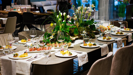 Elegant table decor for luxury dining with floral centerpieces