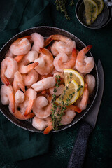 Frozen uncooked prawns or shrimps with lemon