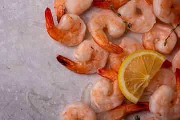 Frozen uncooked prawns or shrimps with lemon