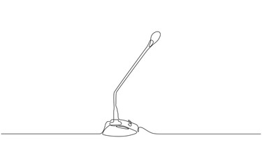A microphone is shown in a black and white drawing. The microphone is placed on a table and is the main focus of the image. The drawing is simple and clean, with no other objects or details visible.