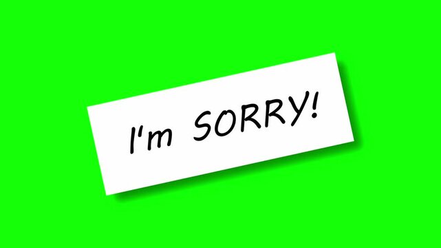 I am sorry written on paper animation on green screen