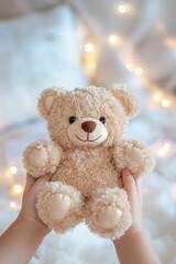 Teddy bear in child hands. Selective focus.
