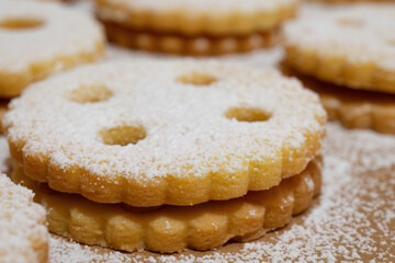 Homemade Linzer cookies with powdered sugar
