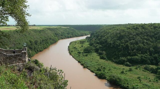 Zoom in shot from Altos de Chavon of the river Chavon and forest around ,travel in Dominican Republic.