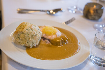 Wedding main course - sirloin sauce with dumplings at the celebration