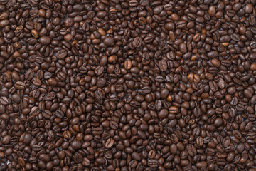 Coffee beans on the surface. Coffee as a background. Top view. Flatlay