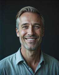 Obraz premium Caucasian middle age guy happy on plain black dark background model portrait pose close up